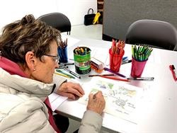 Student drawing comics